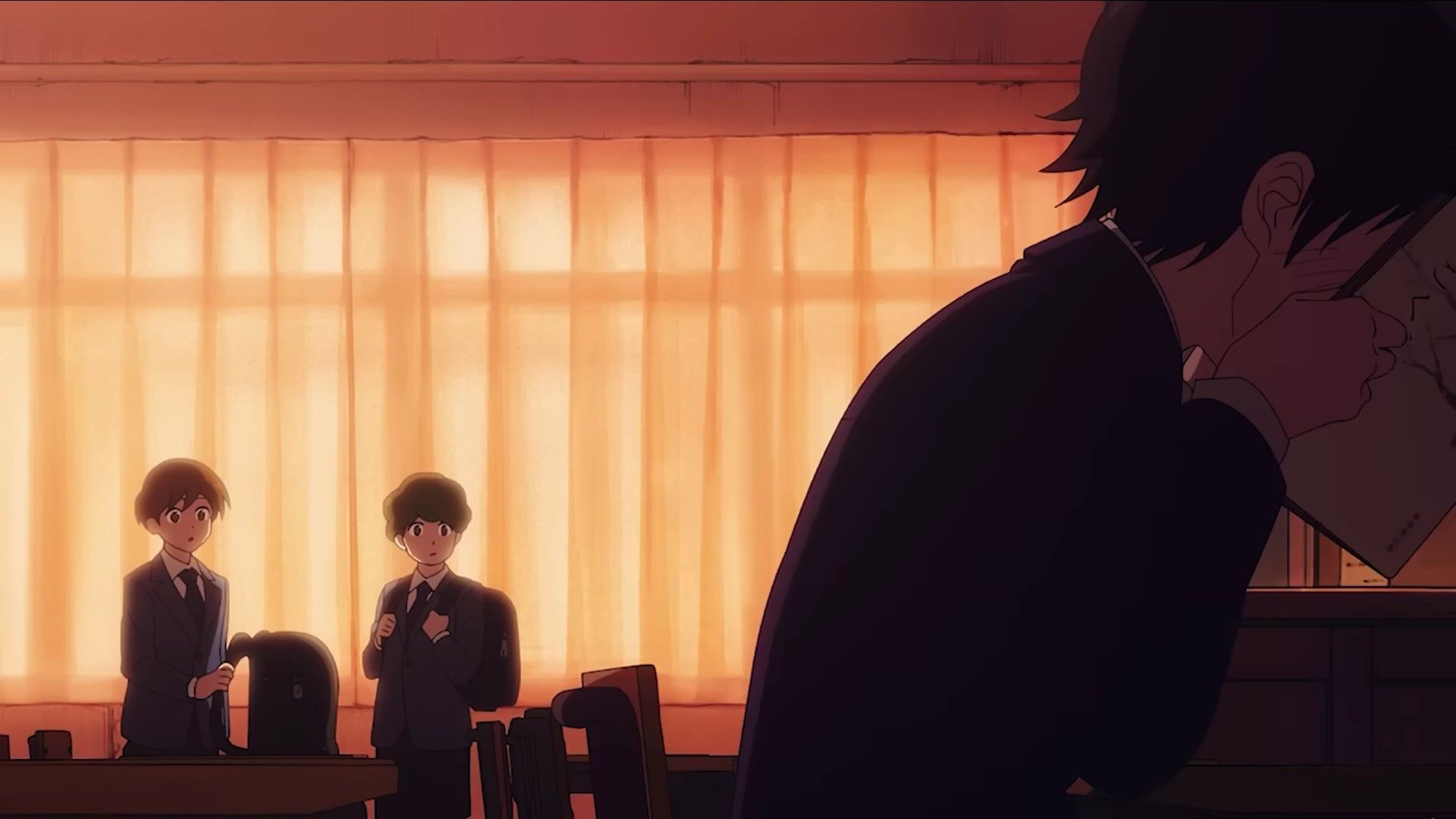 Screenshot from Snowball Earth anime episode 1 showing young Tetsuo shyly avoiding eye contact with his classmates with a book.